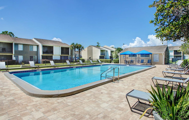 Outdoor pool area at The Fountains at Deerwood Apartments, Jacksonville
