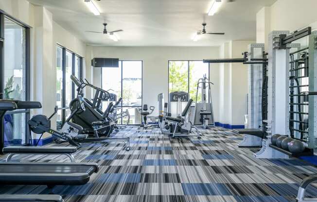 fitness center at Reveal on the Lake apartments