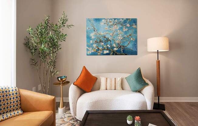 A living room with a white couch, a yellow chair, a green plant, and a painting on the wall.