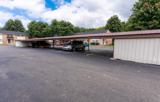 a parking lot with a car in front of a building