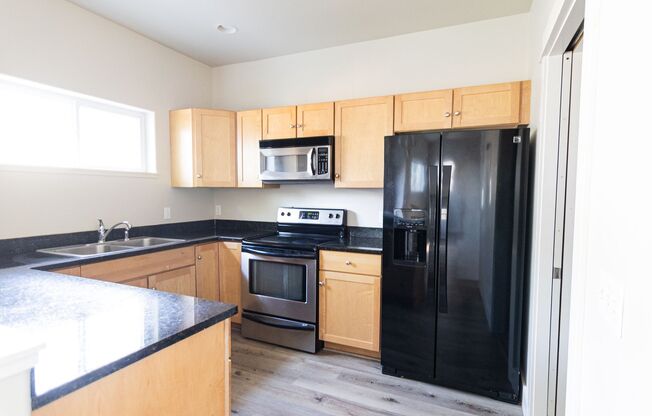 2233 Buckrake Ave | 3-Bedroom Bozeman Townhome with Garage, Fireplace, and Patio