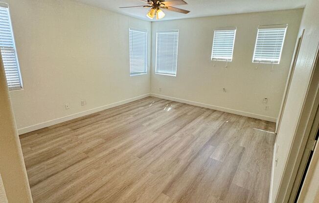 4 bed 2.5 bath home in the southwest with 3 bedrooms downstairs and the master bedroom upstairs! New LVP flooring installed throughout the house!