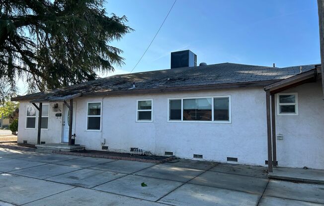 3 bed 2 bath with 4 car garage on corner lot!