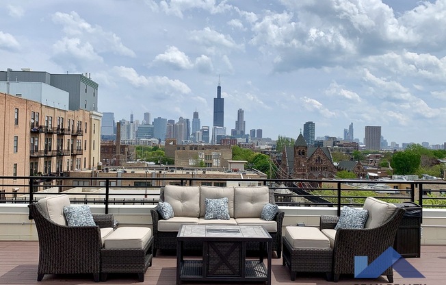 a view of the chicago skyline from a roof deck