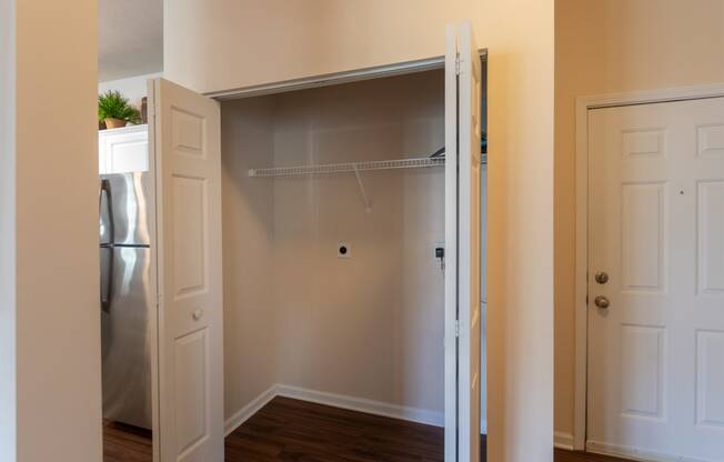 This is a photo of the utility closet with washer/dryer hookups in the 2 bedroom, 2 bath Islander floor plan at Nantucket Apartments in Loveland, OH.