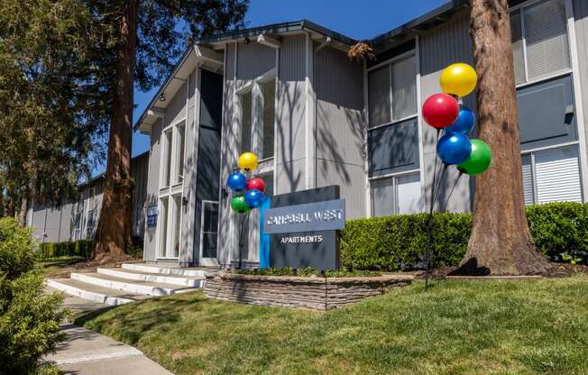 our building is decorated with balloons for a party at Campbell West Apartments, California 95008