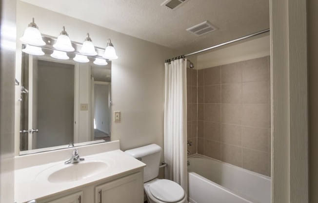 This is a photo of the bathroom in the 899 square foot, 2 bedroom, 1.5 bath apartment at Blue Grass Manor Apartments in Erlanger, KY.