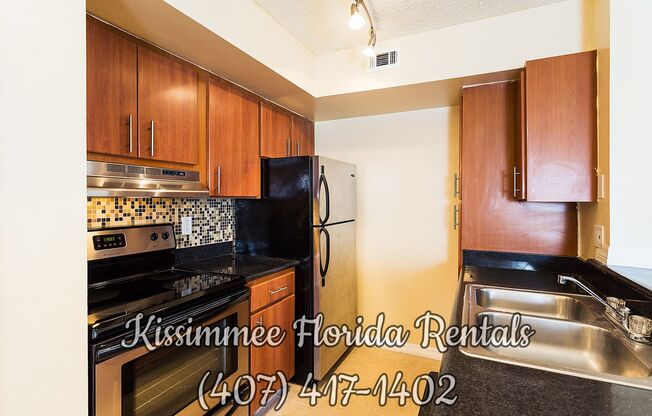 Beautiful two (2) bedrooms and two (2) bathrooms second floor unit in a gated community in the heart of Kissimmee