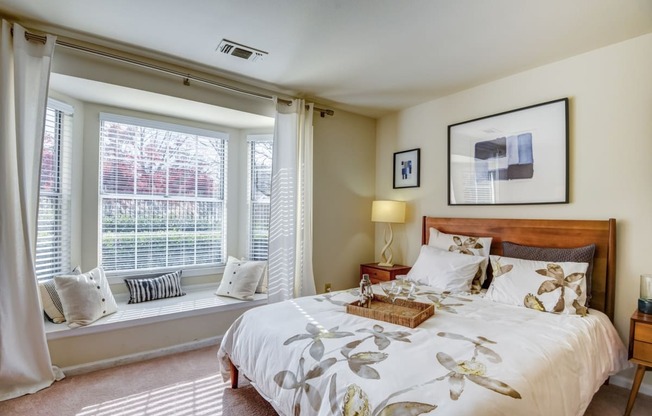 Bedroom With Expansive Windows at Cascades Overlook, Virginia