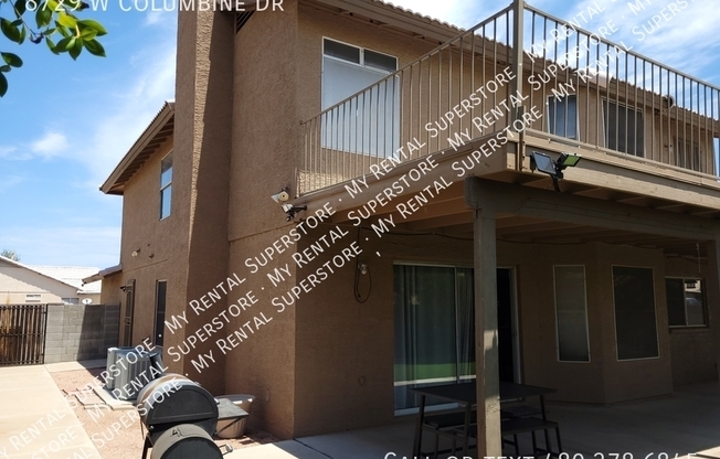 8729 W COLUMBINE DR