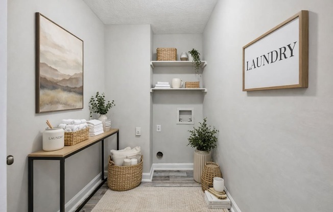 A laundry sign is on the wall of a small, clean laundry room.