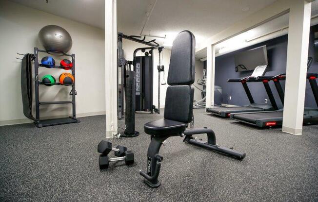 a gym with a lot of equipment in it