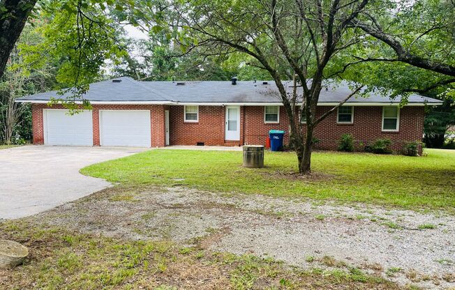 3 bedroom, 1.5 all brick ranch with 2 car garage in College Park! Must see!