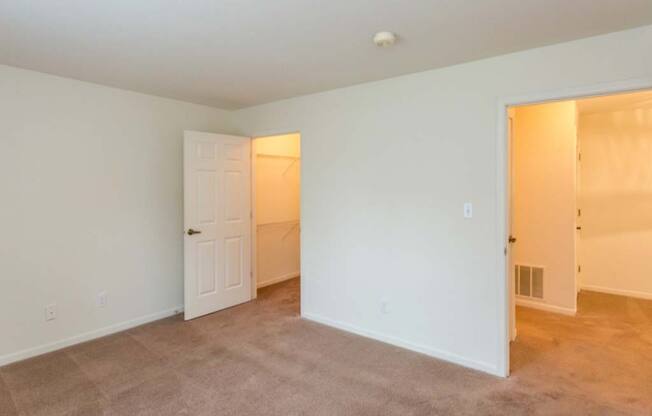 Large bedroom with walk-in closet at Bexley Village, Greenwood, IN