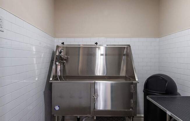 a stainless steel commercial refrigerator in a kitchen