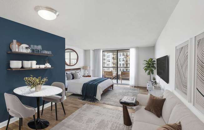 A modern living room with a dining table and chairs.