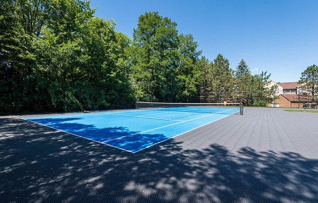 paved, blue tennis court