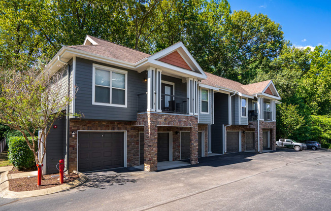 Exterior Of Apartment Homes With Garage Parking Beneath