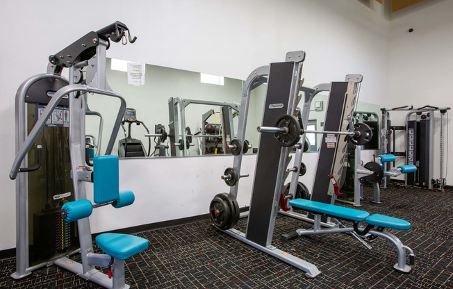 Weight Equipment at Whispering Sands Apartments in Albuquerque