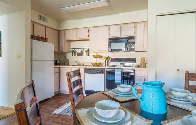 Villas at Montebella spacious kitchen with plenty of cabinetry and dining area near