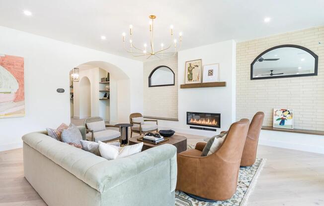Brighlty lit resident lounge with ample social seating.