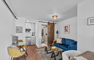 The Prospect Apartments Model Living Room with Kitchen and Bathroom