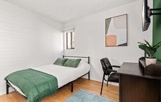 A fully furnished 4 bedroom, 2 bathroom apartment with common areas at 1823 Pelham Ave. Unit 1