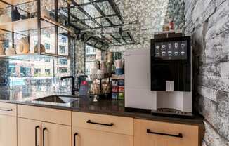 a kitchen with a counter top and a sink  at Century West Pryor, Missouri, 64081