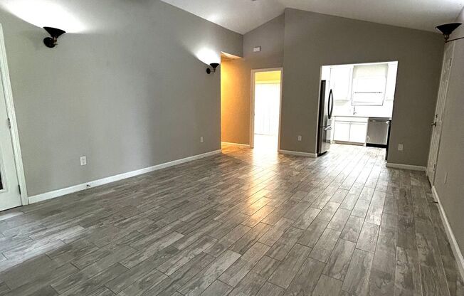 Large new in 2022 home with 2 car garage, fenced year and open spaces.