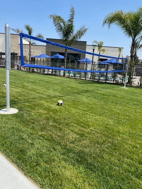 a soccer ball in the grass in front of a buildingat Westbury Apartments, Rancho Cucamonga, 91739