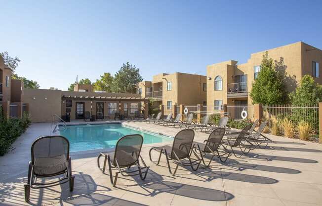 our apartments have a resort style pool and lounge chairs