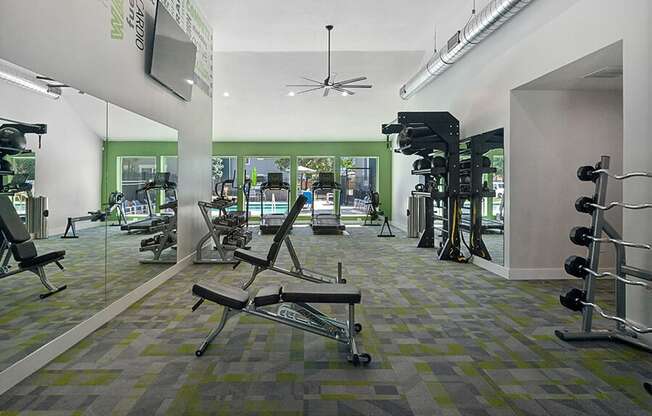 Community Fitness Center with Equipment at Overlook Apartments located in Salt Lake City, UT.