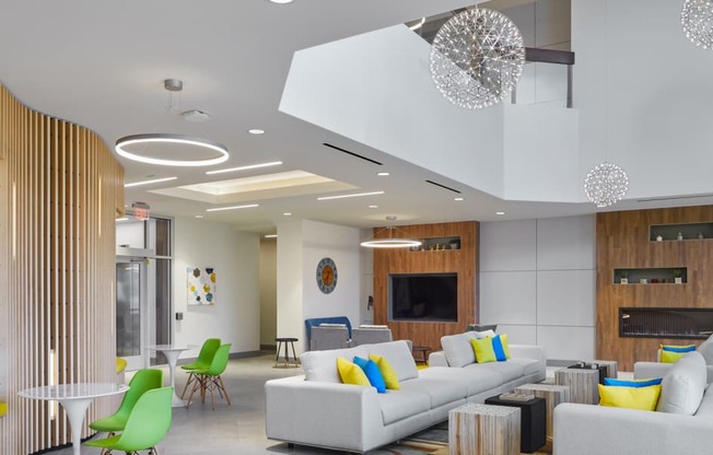 Lounge Seating, Work Stations & Relaxing Fireplace at The Oxford Apartments, Oxon Hill