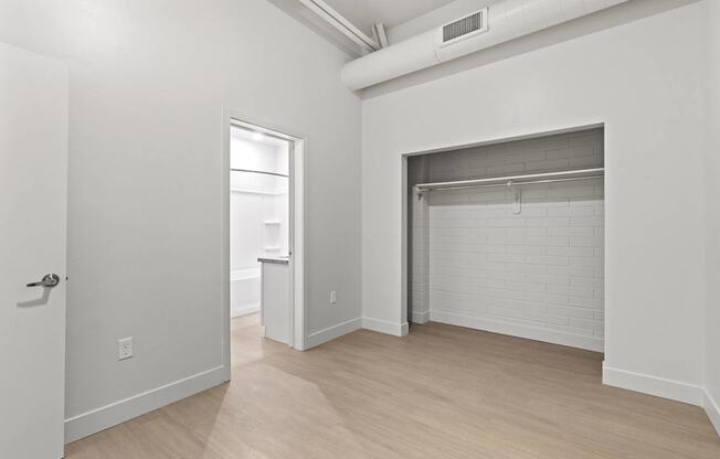 A white room with a door and a window. at Brickside Heights, Millcreek, 84106