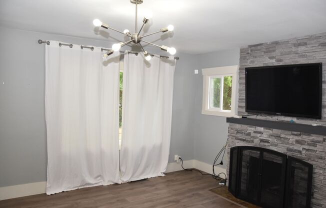 4 bedroom 4 Bath! Updated Kitchen and Bathrooms and Fully Finished Basement. With AC!