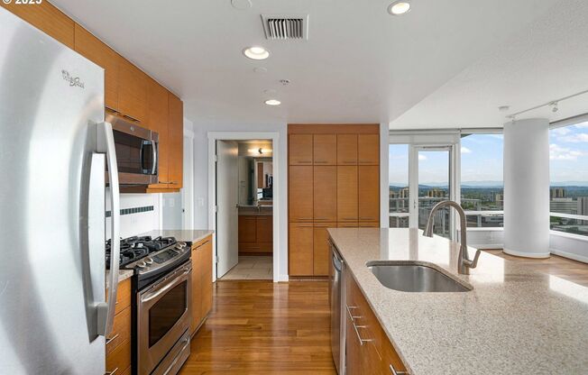 Modern 2-Bed/2-Bath Condo with Balcony, Parking & Prime Downtown Location
