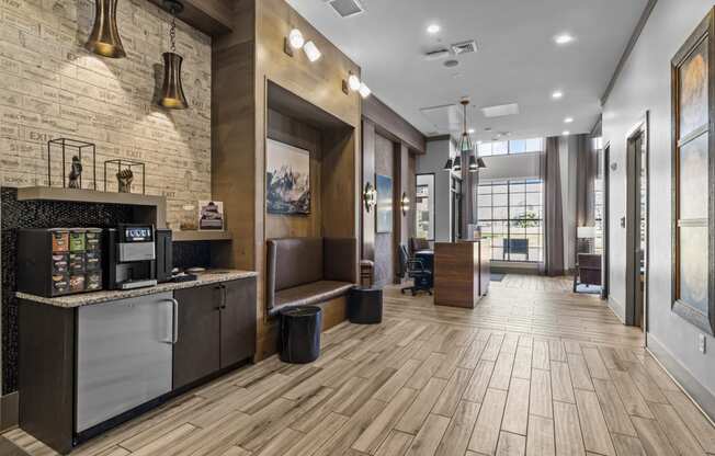 the lobby of a hotel with a reception desk and a coffee machine at Alton Jefferson Park, Colorado