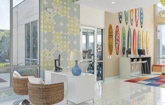a living room with surfboards on the wall at Lakeside Villas, Orlando