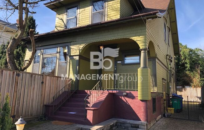 Close-In NE Portland Victorian Offers  Perfect Blend of  Old Charm with New Amenities. Lush Private Yard w/Patio!