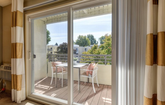 Apartment siding glass door that leads out to the private patio.