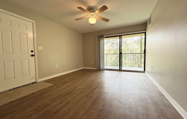 Lovely Winter Springs Condo ~ Vinyl Plank Flooring and Large Screened Patio!