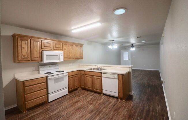 FOR LEASE! Nicely Remodeled 3 BR - 2 BA Brick Duplex With a 2 Car Garage in Weatherford.