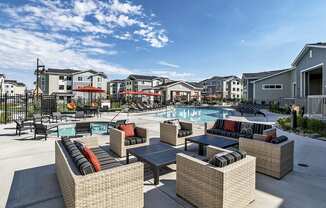 Colorado Springs Apartments Near Lockheed Martin with Outdoor Pool Lounge