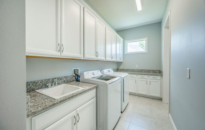 Luxurious 5 Bed/5Bath Home in the Sought-After Eagle Creek Community in Lake Nona!