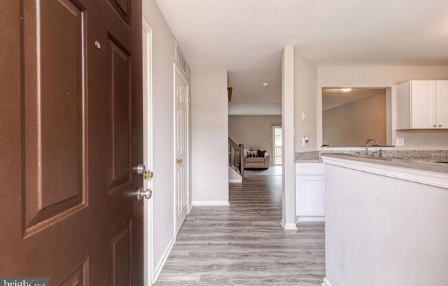 Welcome to 3 Greenshire Lane, a 3bd 2/2bth townhome in the sought after Owings Mills community of Garrison Woods