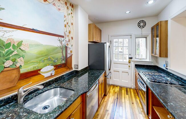 NW DC locale...3 level - 2 bed + Den with 2.5 & off street parking  - 16 months only