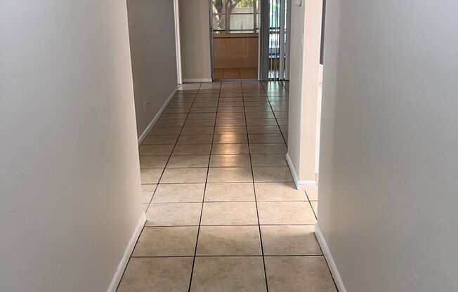 Move-In Ready 2bd-2bath Duplex with 2 Screened Lanais, Washer and Dryer, location and  Modern Upgrades!