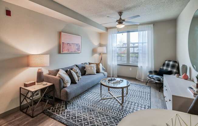 Living Room With Plenty Of Natural Light at Platform 14, 1030 NE Orenco Station Pkwy, Hillsboro