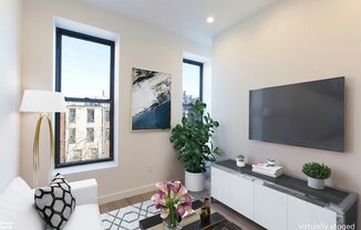 111 W 130 ST