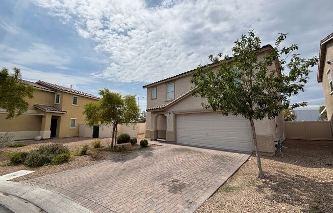Gorgeous 4Bed/2.5Bath/2Car home located in North Las Vegas Raven Hill gated community!